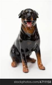 Labrador Retriever Black. Ceramic figurine, dog breed isolated on white