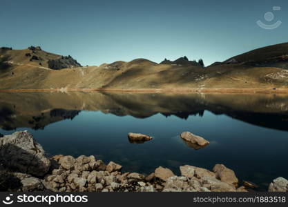 Lac De Lessy and Mountain landscape at sunrise in The Grand-Bornand, Haute-savoie, France. Lac De Lessy and Mountain landscape at sunrise in The Grand-Bornand, France