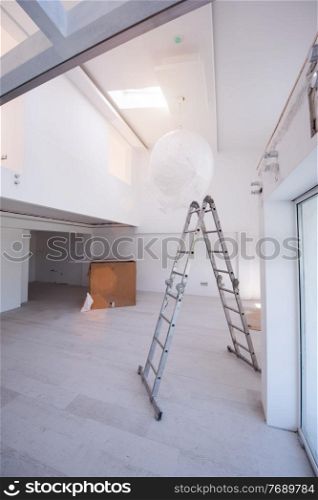 ladder in Interior of apartment during construction, remodeling, renovation, extension, restoration and reconstruction