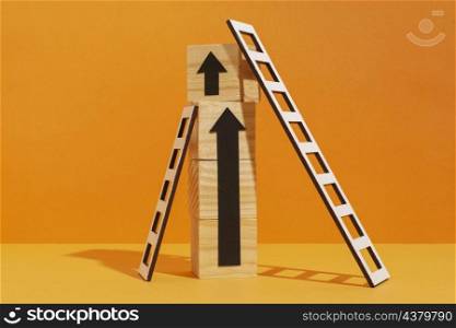 ladder with wooden cubes arrow