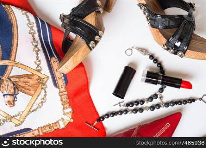 lady lifestyle background with shoes and accessory around white background. flat lay