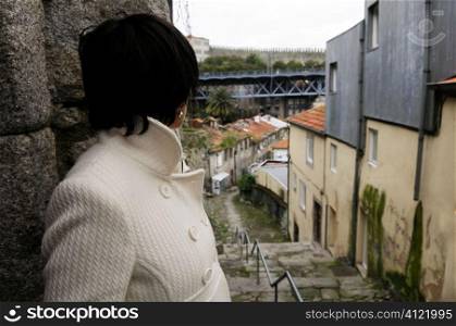 Lady standing in narrow street