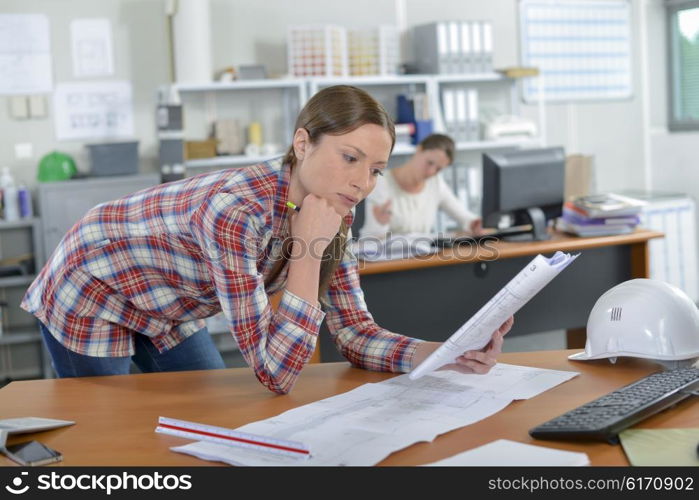 Lady studying paperwork