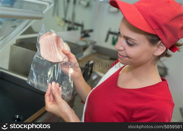 Lady working in fast food outlet