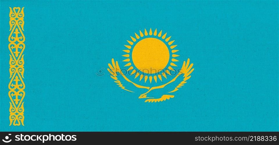 lag of Kazakhstan. National Kazakh flag on fabric surface. Kazakh national flag on textured background. Fabric Texture. Republic of Kazakhstan. flaflag of Kazakhstan. National Kazakh flag on fabric surface. Fabric Texture