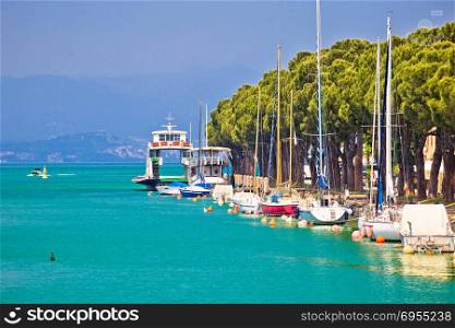 Lago di garda turquoise waterfront in Peschiera view, Veneto region of Italy