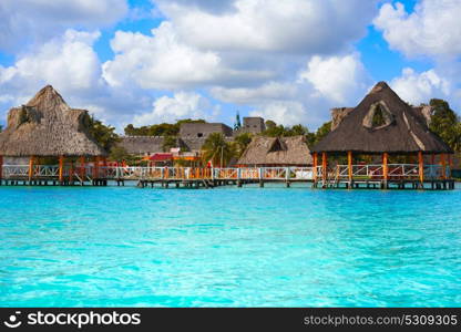 Laguna de Bacalar Lagoon palapas in Mayan Mexico at Quintana roo