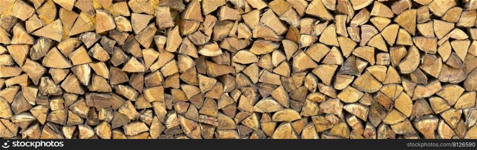 laid dry firewood lie on the pile background