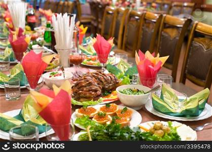 laid table with tableware and dishes, ready for banquet, shallow DOF