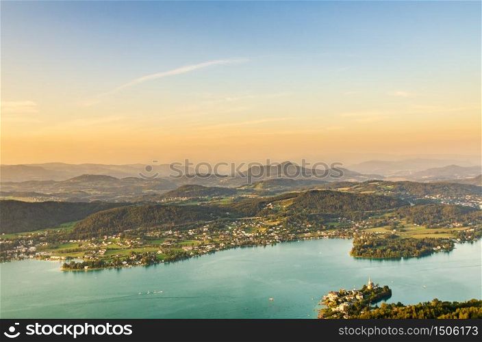 Lake and mountains at Worthersee Karnten Austria. View from Pyramidenkogel tower on lake and Klagenfurt the area.. Lake and mountains at Worthersee Karnten Austria tourist spot
