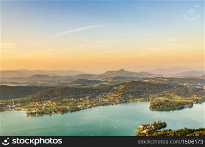 Lake and mountains at Worthersee Karnten Austria. View from Pyramidenkogel tower on lake and Klagenfurt the area.. Lake and mountains at Worthersee Karnten Austria tourist spot