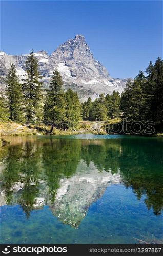 Lake Bleu and the south face of Matterhorn. Sunny summer day. Valle d&acute;Aosta, Italy.