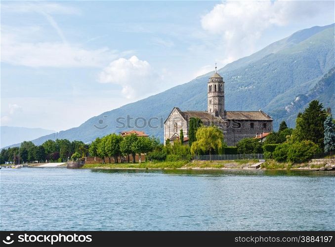 Lake Como (Italy) shore summer view with church from ship board
