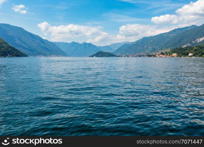 Lake Como (Italy) summer coast hazy view from ship board.