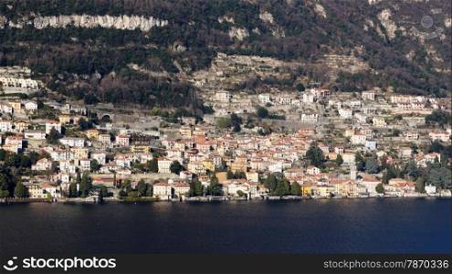 Lake Como (Italy) summer view and Menaggio town on shore.. Lake Como and Menaggio town on shore.