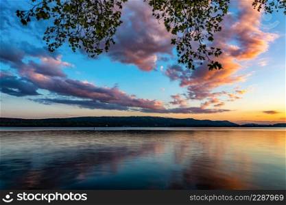 Lake Constance at sunset summer with red clouds on the sky