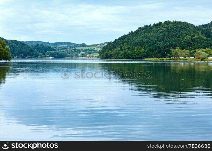 Lake Czorsztyn, Poland. Summer cloudy country view.