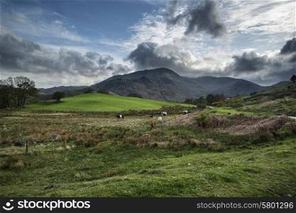 Lake District landscape with stormy sky over countryside and fells