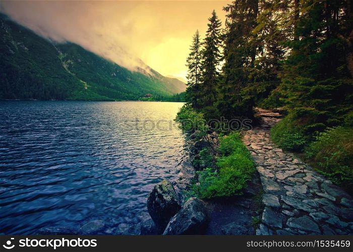 Lake in mountains. Fantasy and colorfull nature landscape. Morskie Oko lake.