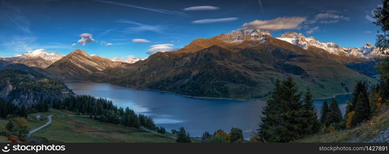 Lake in the French Alps. reflection of the snowy mountains in autumn