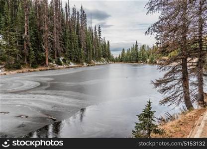 Lake Irene frozen over in Rocky Mountain National Park