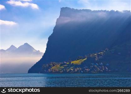 Lake Lucerne alpine peaks and green slopes view, beautiful landscapes of Switzerland