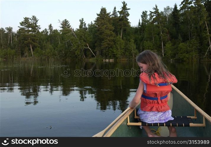Lake Photography - Child in Canoe on Lake