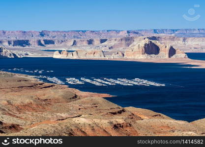 Lake Powell in desert Landscape and yacht Marinas recreation center at Page city Arizona, United States. USA Landmark environmental water resources reservoir sport and recreation concept.