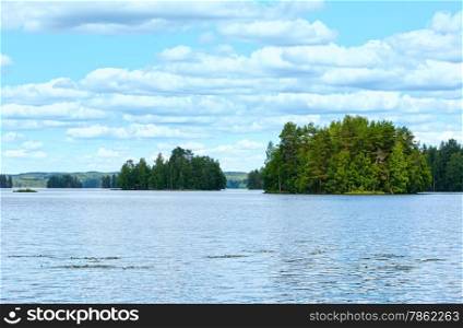 Lake Rutajarvi summer view with forest on the edge (Urjala, Finland).