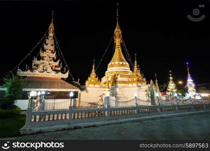 Lake with Wat Chong Klang and Wat Chong Kham temples at the night in Mae Hong Son, Thailand