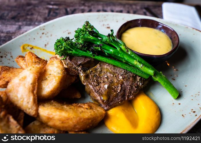 Lamb steak with potatoes in luxury restaurant.