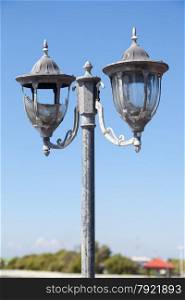 lamp is defective. Sky on a clear sunny. The lamp can be damaged
