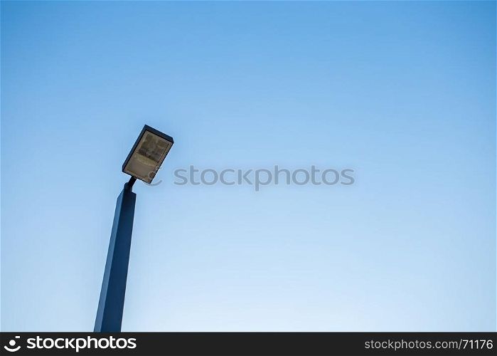 lamp post on blue sky
