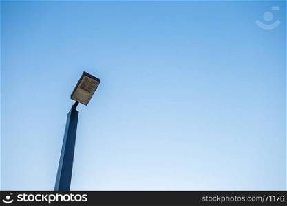 lamp post on blue sky
