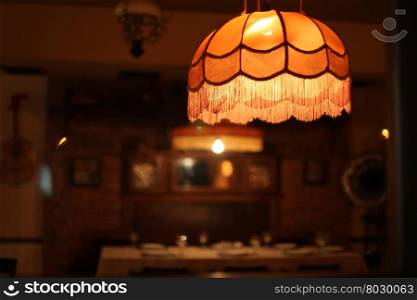 lamp shade in blur evening home room
