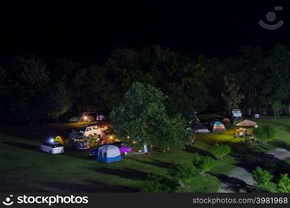 Lampang, Thailand - November 26, 2021 : Tourists camping at night, There are beautiful star in the sky. Chaloem Phrakiat Park, Thung Bua Tong, Mexican sunflower field, Mae Moh, Lampang, Thailand.. Night Chaloem Phrakiat Park Mae Moh editorial