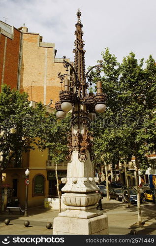 Lamppost in front of a building, Barcelona, Spain
