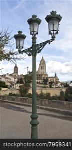 Lamppost in Square Queen Victoria Eugenia with the Cathedral on the background in Segovia, Spain