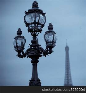 Lampposts on the Pont Alexandre III bridge in Paris France