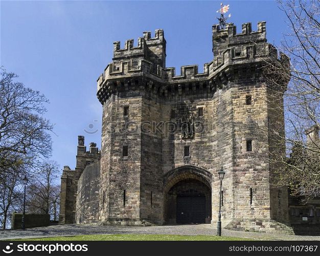 Lancaster Castle is a medieval castle located in Lancaster in the English county of Lancashire. Its early history is unclear, but may have been founded in the 11th century on the site of a Roman fort overlooking a crossing of the River Lune. It is now used as a prison.