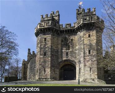 Lancaster Castle is a medieval castle located in Lancaster in the English county of Lancashire. Its early history is unclear, but may have been founded in the 11th century on the site of a Roman fort overlooking a crossing of the River Lune. It is now used as a prison.
