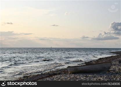 Landed rowing boat by the coast of the Baltic Sea at the northernmost part of the island Oland
