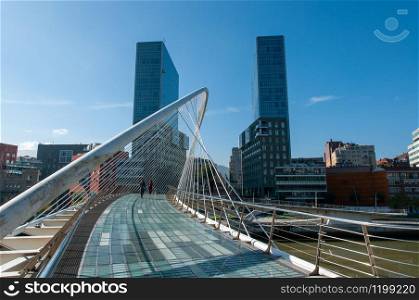 Landmark of ISOZAKI ATEA twin towers and Zubizuri (campo volantin) bridge. Bilbao, Spain