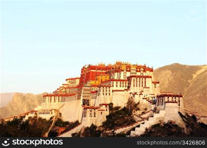 Landmark of the famous historic Potala Palace in Lhasa Tibet at sunrise