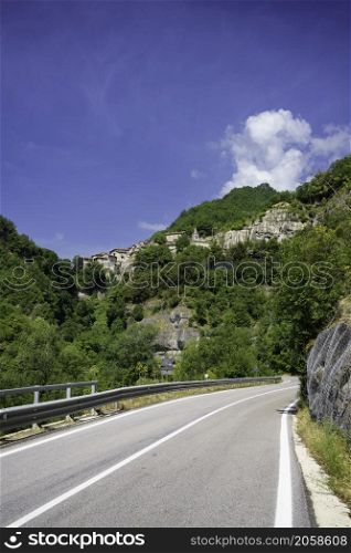 Landscape along the old Salaria road in the Ascoli Piceno province, Marche, Italy, at springtime. A village