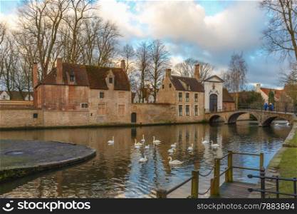 Landscape at Lake Minnewater with bridge in Bruges, Belgium