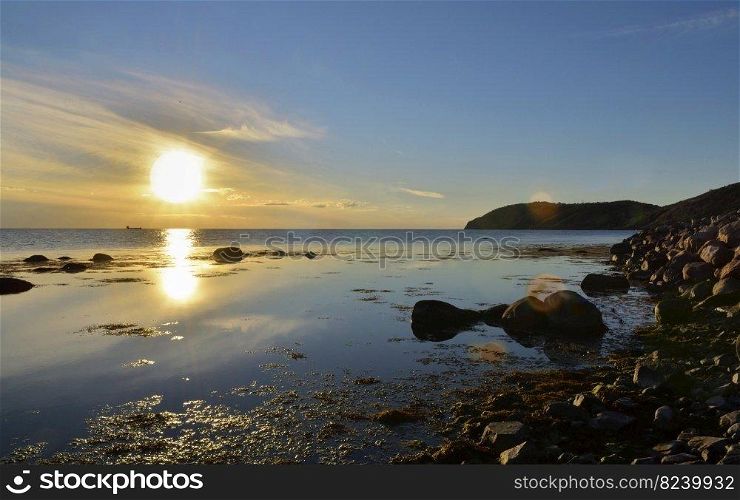 landscape at sunset over the sea of the suedoise rocky coast 