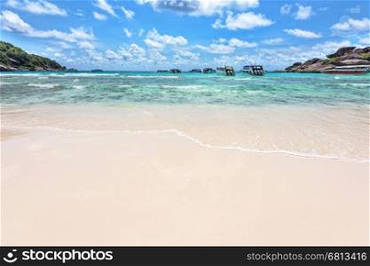 Landscape beautiful blue sea and summer sky above the bay front beach was used as a quay speed boat of tourist at Koh Similan Islands in Mu Ko Similan National Park, Phang Nga province, Thailand