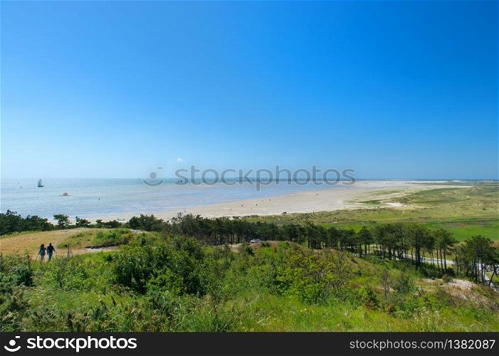 Landscape coast on Dutch wadden island with beach and ocean