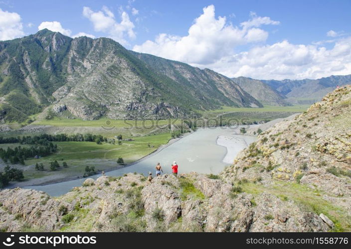 Landscape girl in Altai mountains in Russia